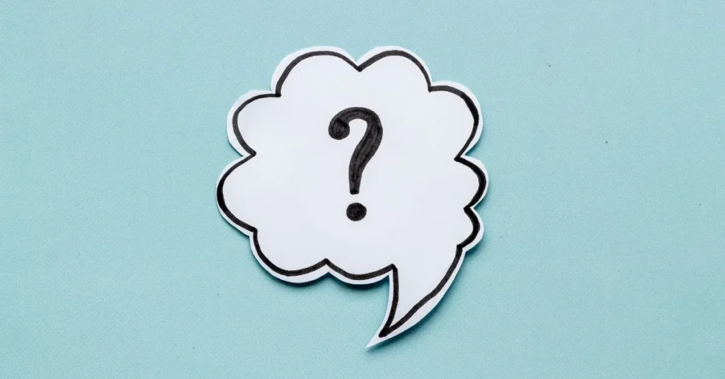 A black question mark with white background.